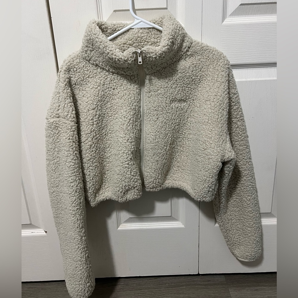 SKIMS TEDDY ZIP UP CROP JACKET | COLOR: BONE 
SIZE:  M